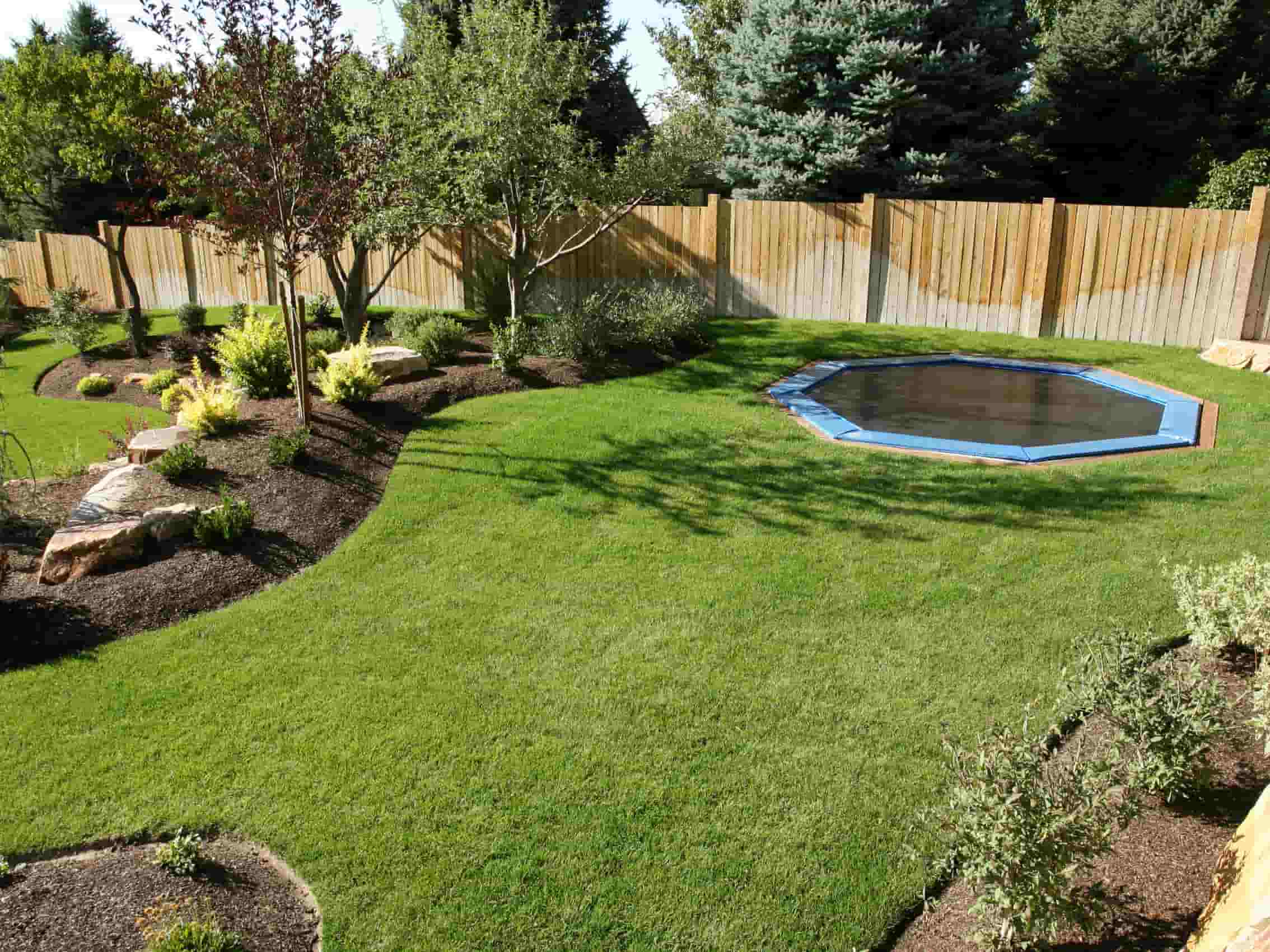 This is a newly landscaped garden which includes new turf, and a trampoline sunk into the ground